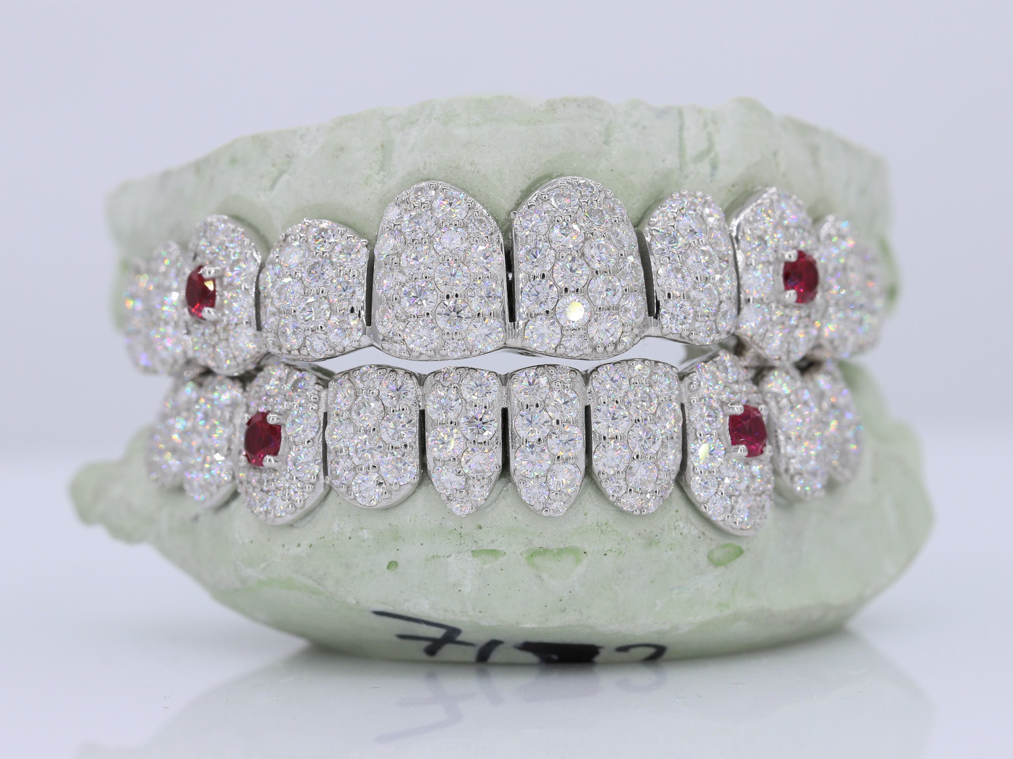 Jumbo Ruby Fang Pointer VVS Moissanite Diamond Grillz – Moissanite